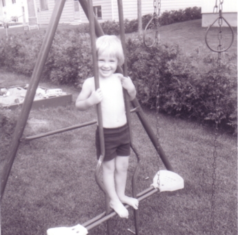 Ian on the swings at 2029